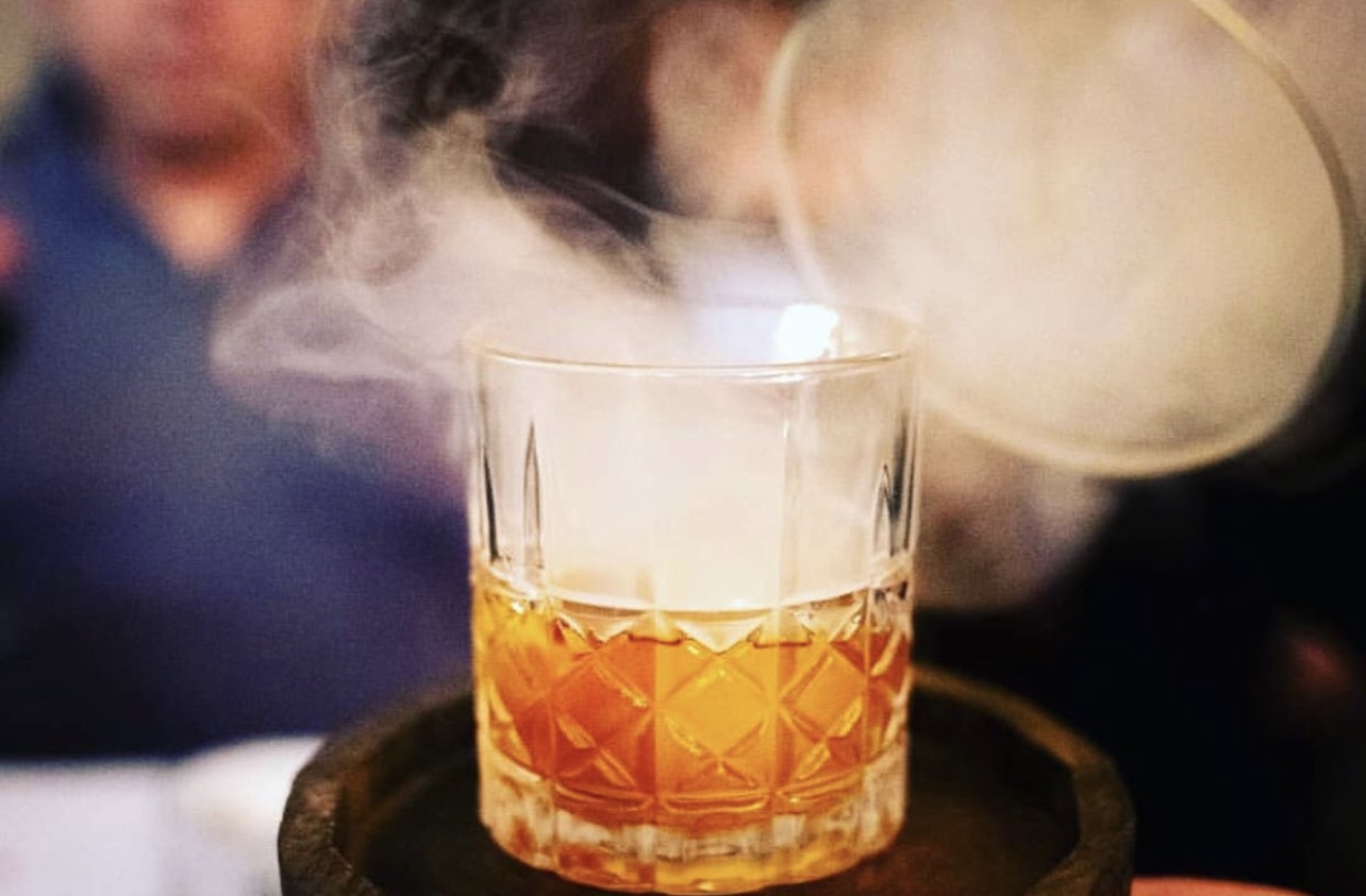 A smoked old fashioned cocktail